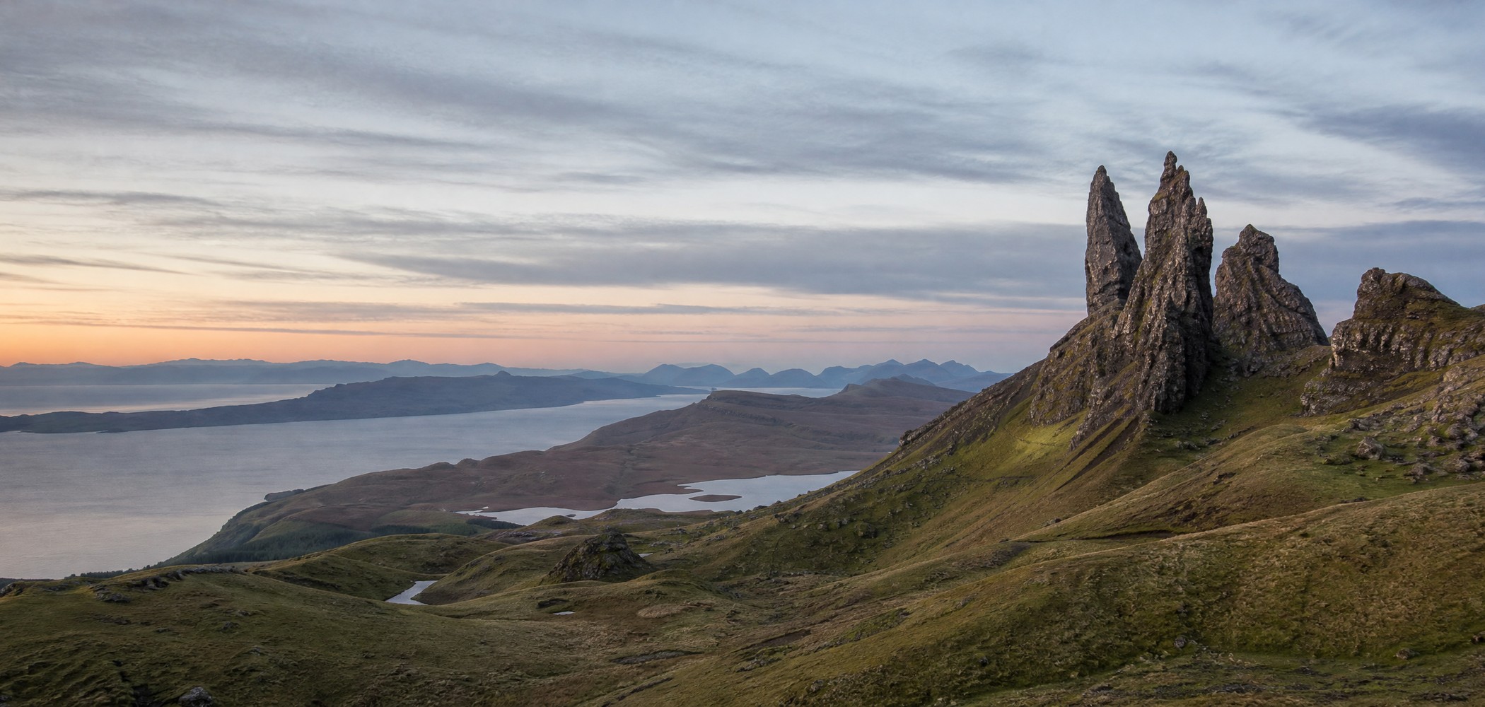 Old Man of Storr rock pinnacles above an empty moor on the Isle of Skye.