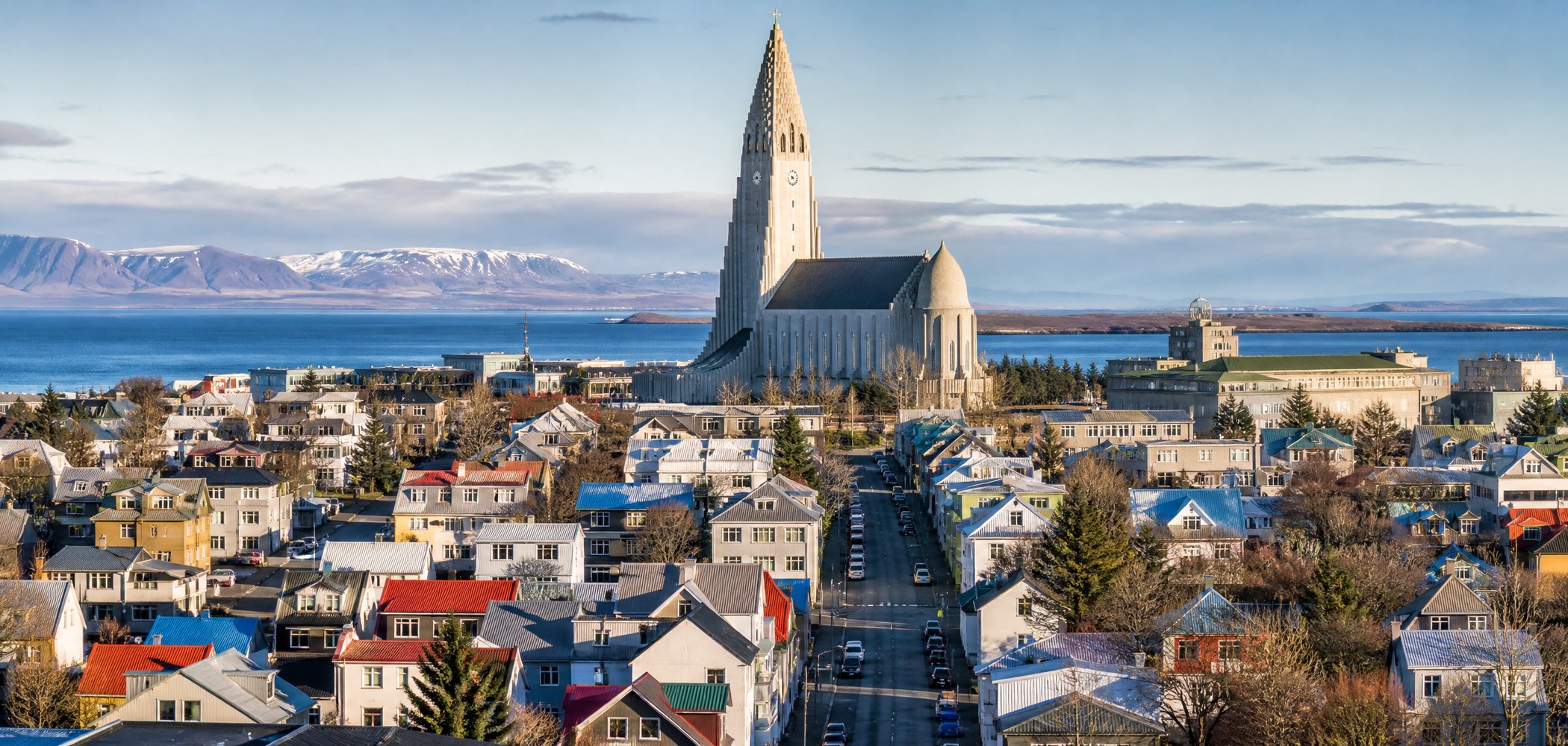 Hallgrímskirkja church above the rooftops of Reykjavík, Iceland.