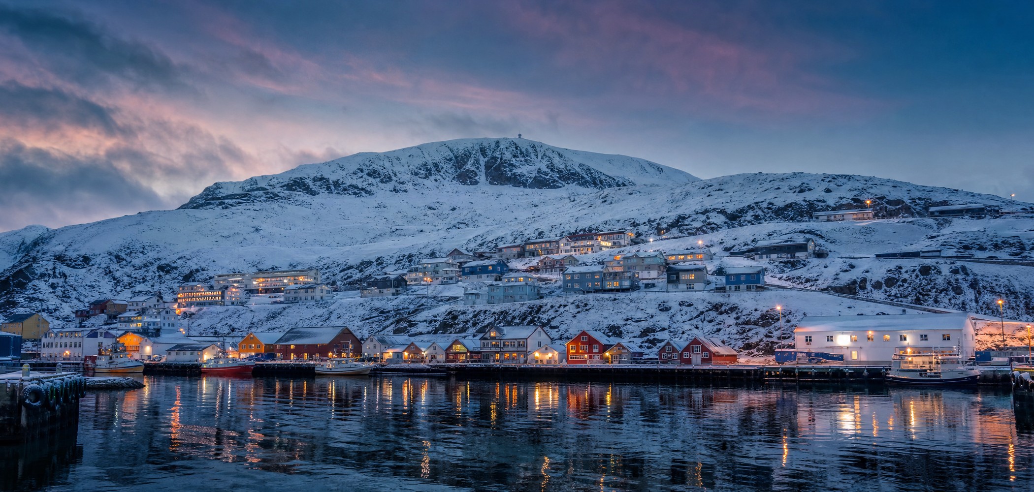 People-free editorial view of Honningsvag Winter Harbour.