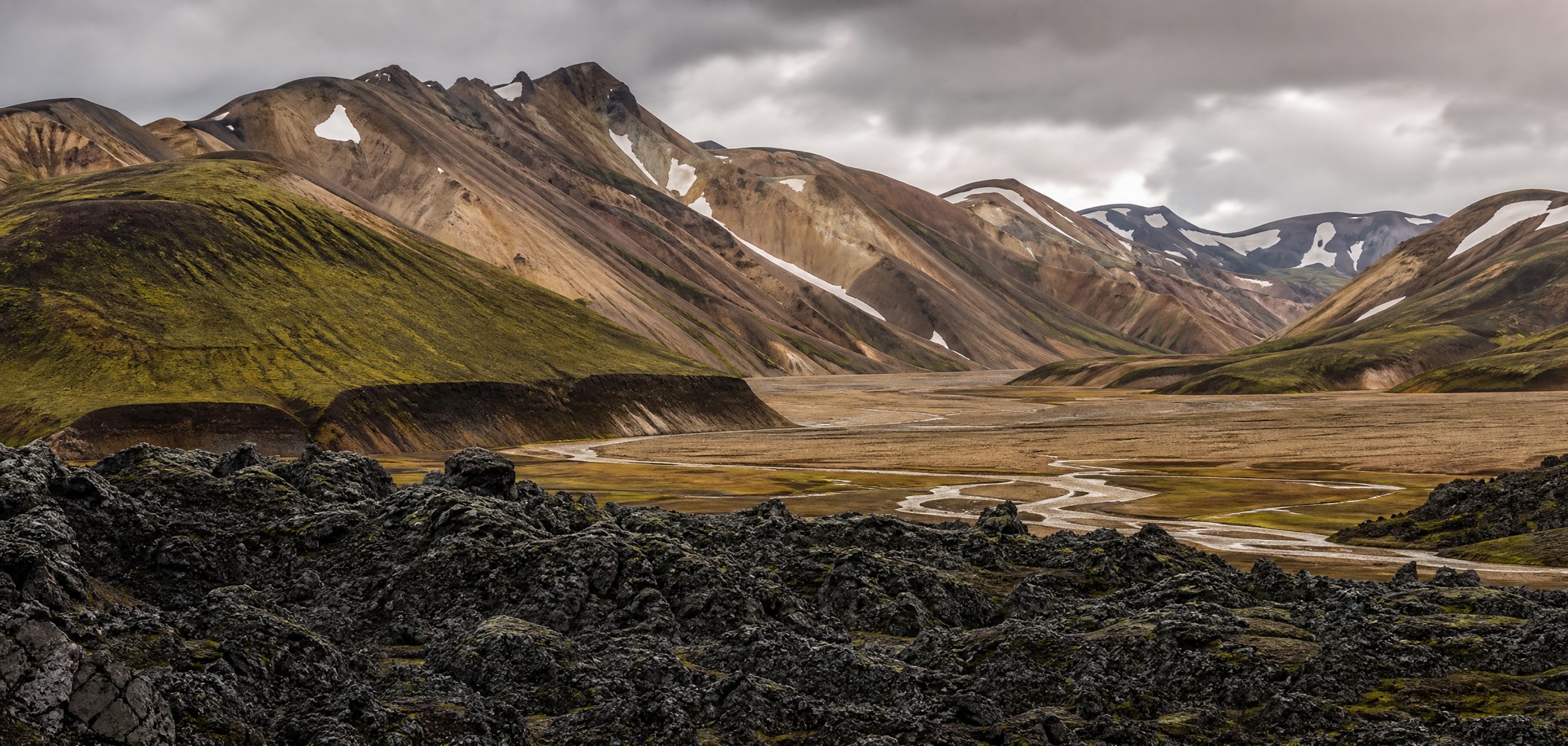 Colourful rhyolite mountains and lava fields at Landmannalaugar, Iceland.