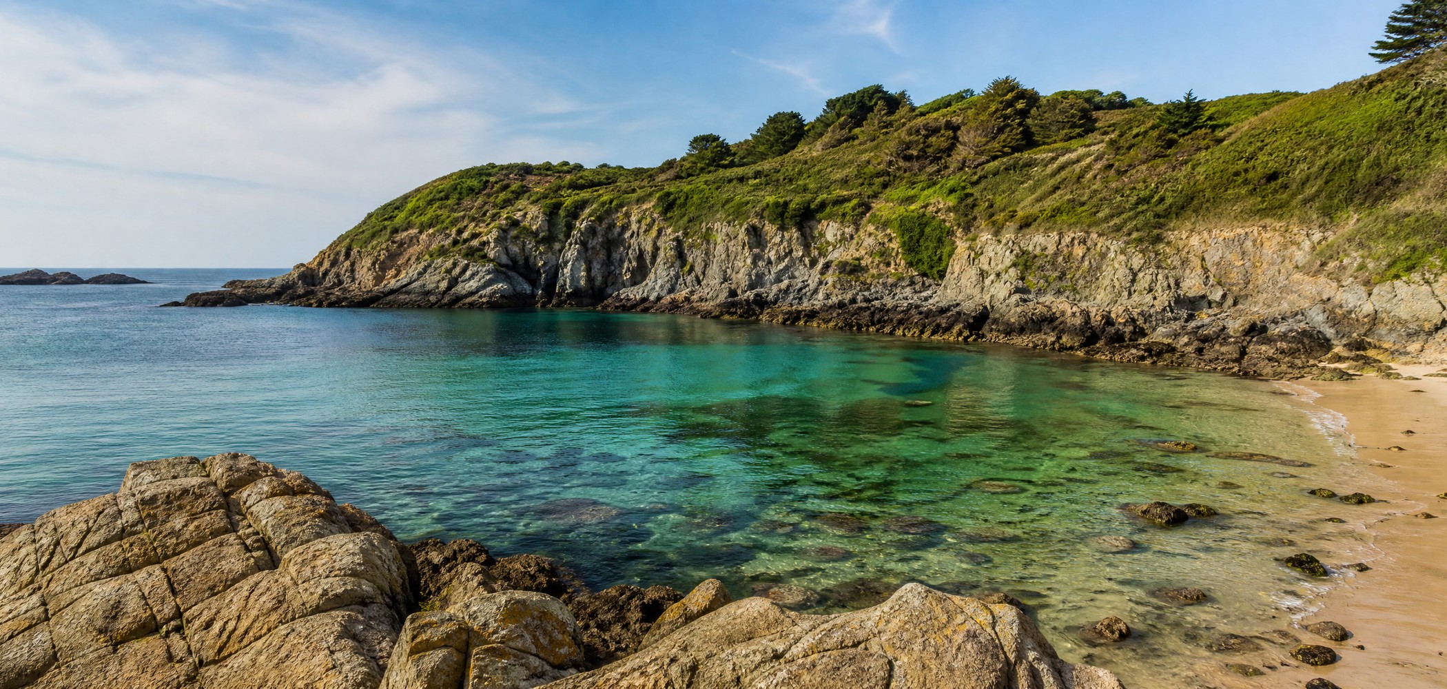 People-free editorial view of Petit Bot Bay.