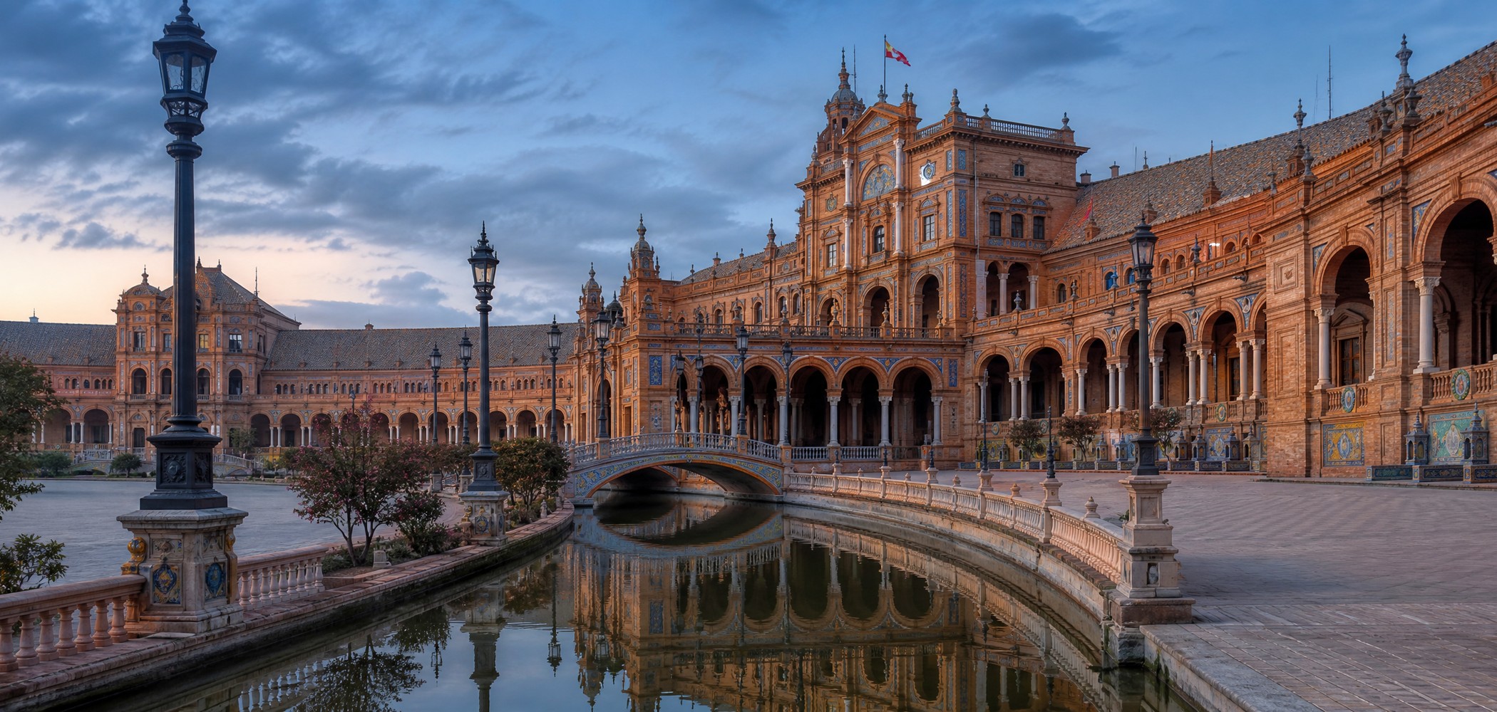 Plaza de España and canal in Seville at early morning.