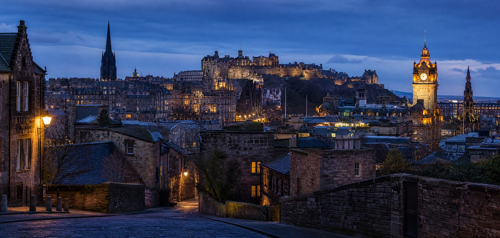 Edinburgh Castle and Old Town skyline at blue hour in Scotland.