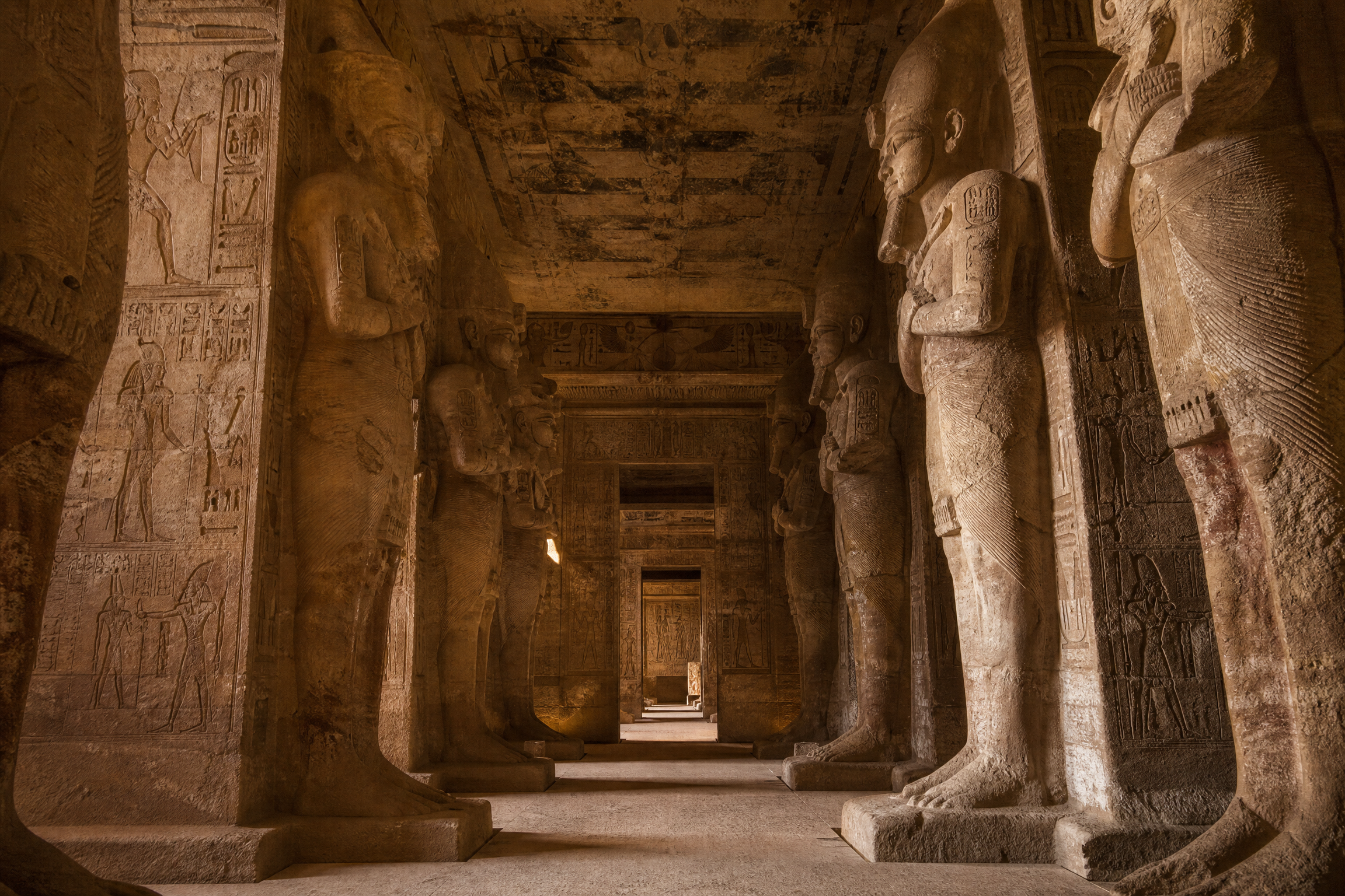 Interior hypostyle hall at Abu Simbel with Osiride pillars and carved reliefs