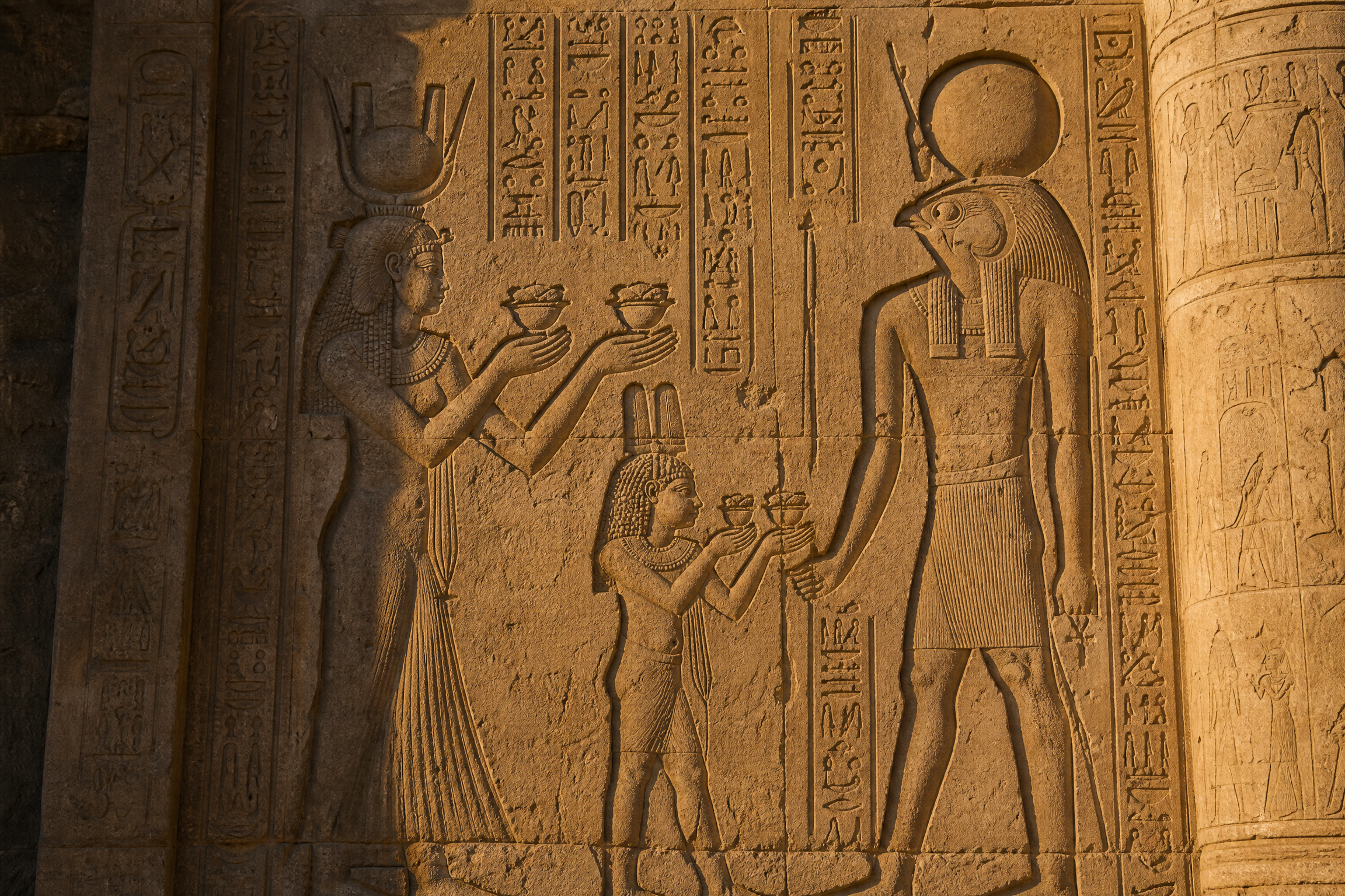 Relief carving of Cleopatra VII and her son Caesarion on the rear exterior wall of Dendera Temple, Egypt