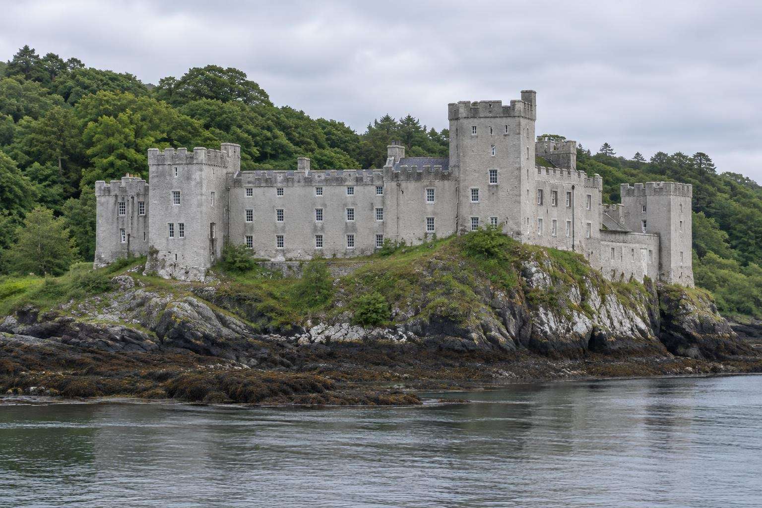 Dunvegan Castle on its rock above Loch Dunvegan, Isle of Skye, the seat of the chiefs of Clan MacLeod