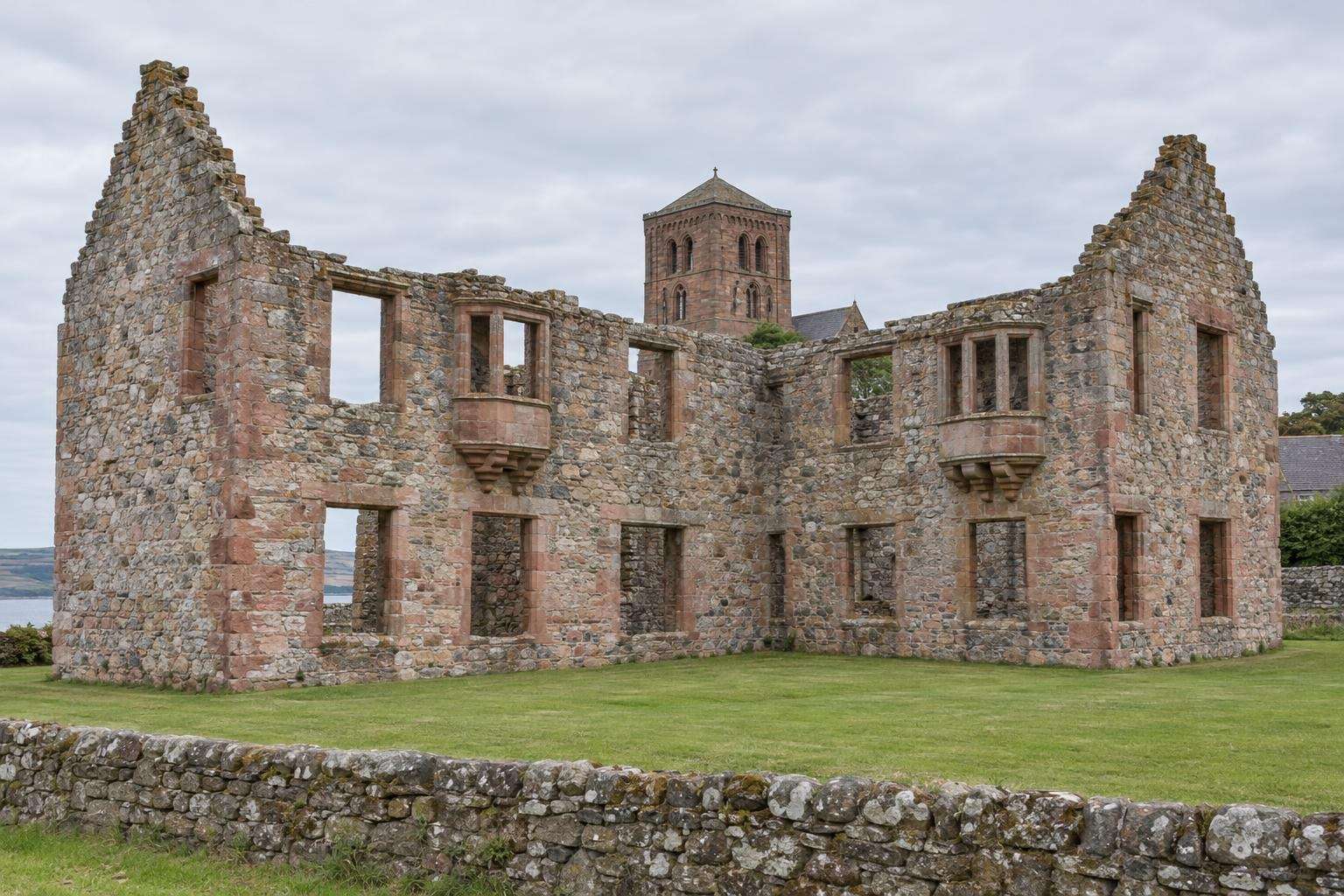 The roofless Earl's Palace in Kirkwall, Orkney, with the tower of St Magnus Cathedral behind