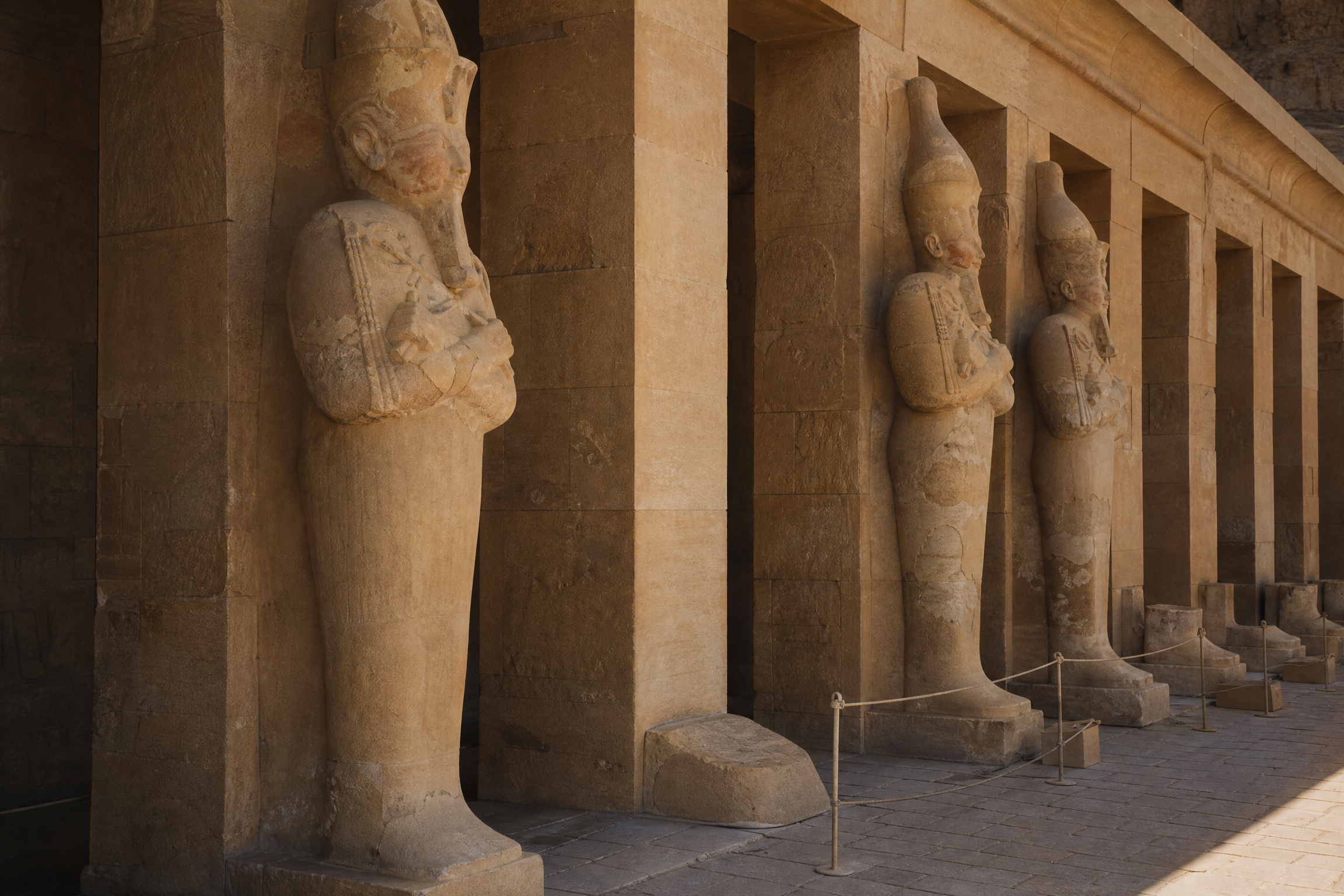 Colonnade of square pillars and Osiride statues on the upper terrace of the Temple of Hatshepsut