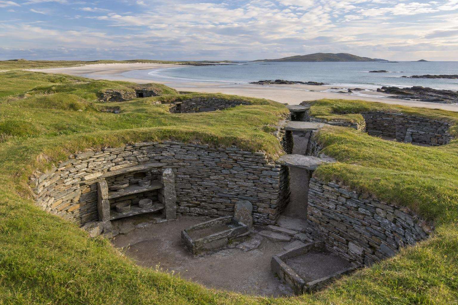 The Neolithic village of Skara Brae above the Bay of Skaill on Orkney's west coast